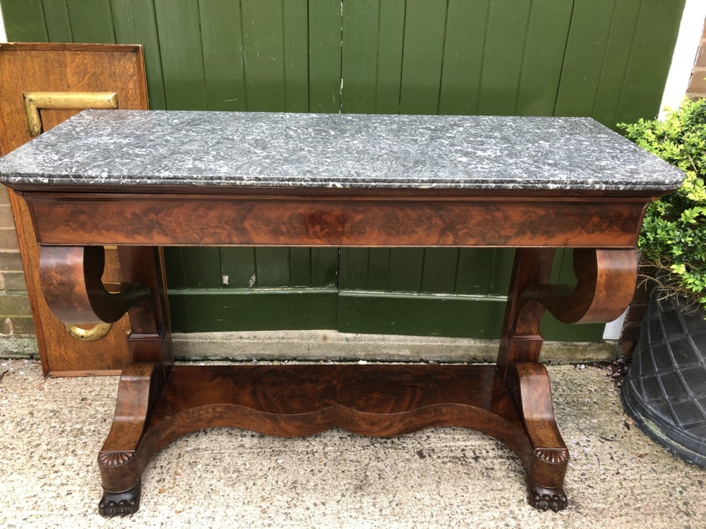 Early C19th French Charles X Restauration period mahogany console table fitted with original marble top . View XVI