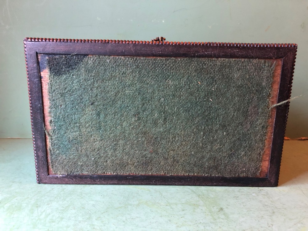 A dark rosewood rectangular desk tidy featuring a central turned wood and brass handle, hinged lids, and a moulded base. View XXII