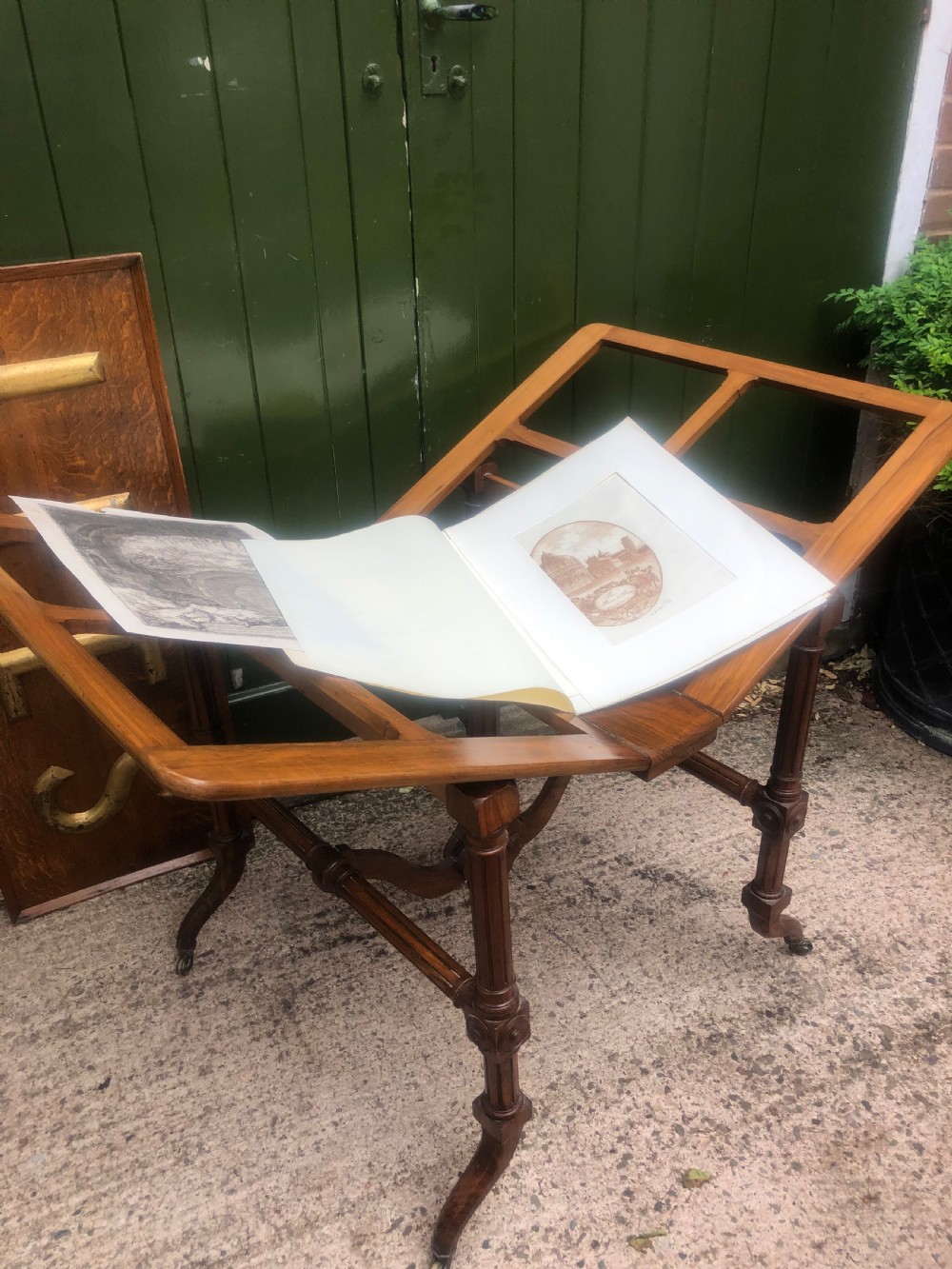 Mid C19th walnut-framed library or gallery folio-stand with an unusual folding action . View XI