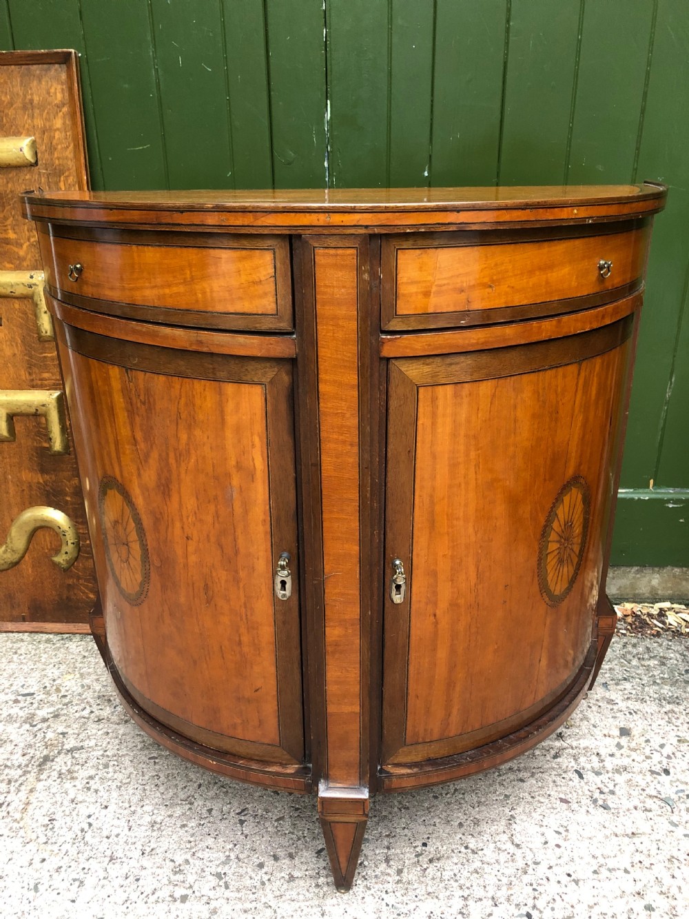 Late C18th Dutch neo-classical design satinwood demi-lune commode . View II