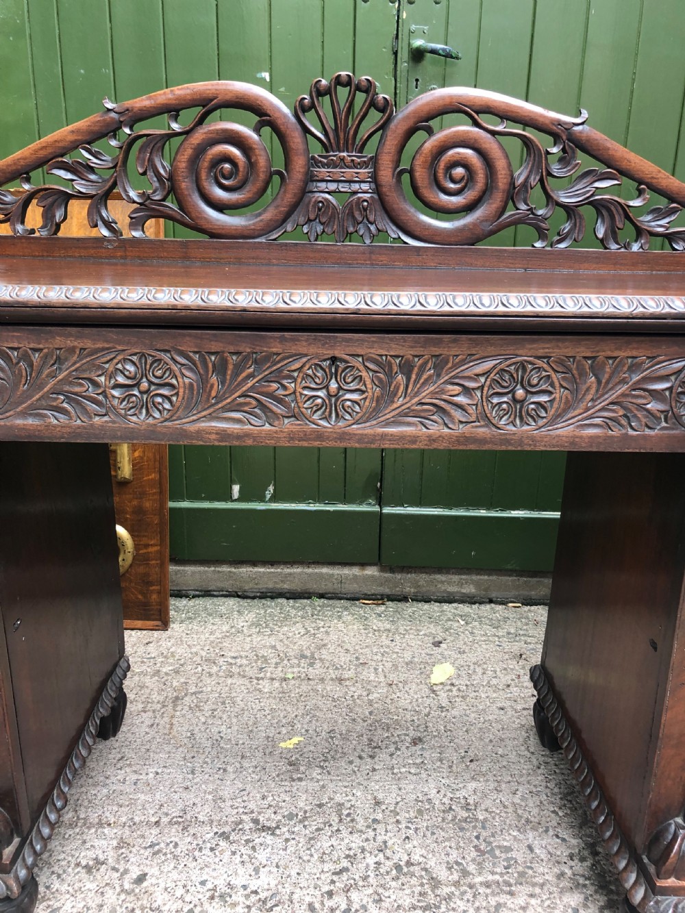 C19th Anglo-Indian carved padauk pedestal sideboard. View V