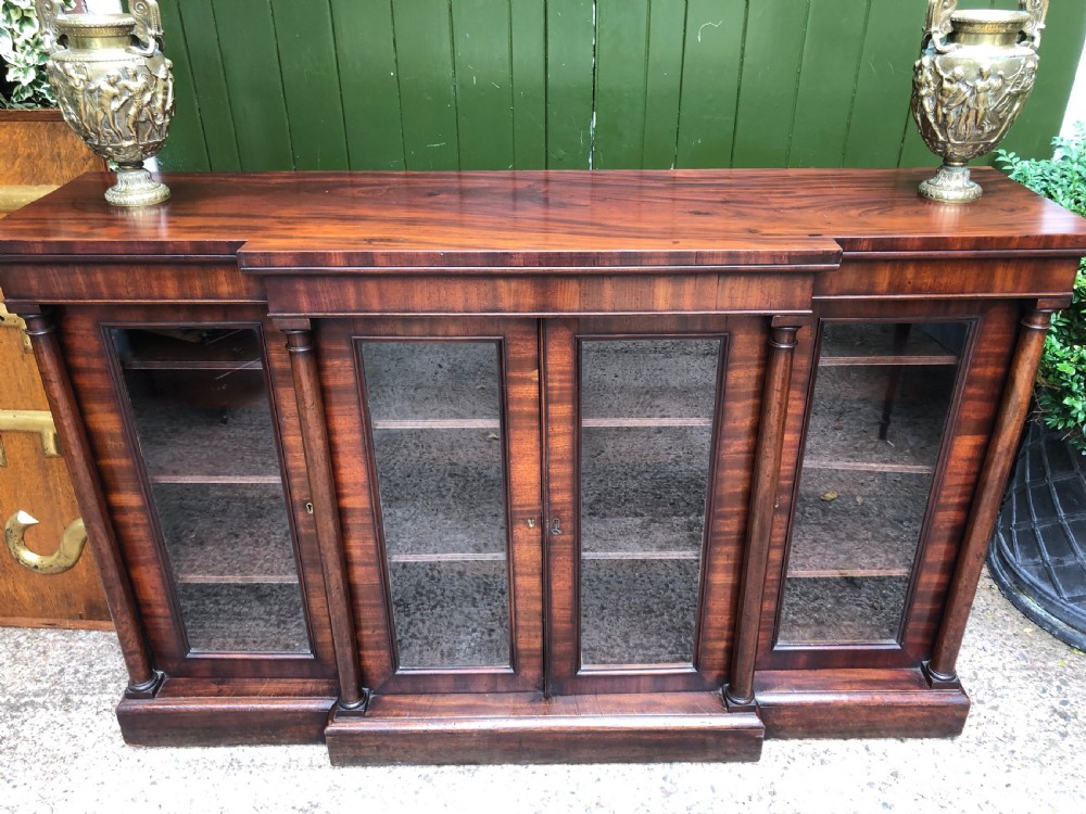 Early C19th Regency period mahogany 4-door ‘dwarf’ bookcase cabinet of breakfront outline. View VIII