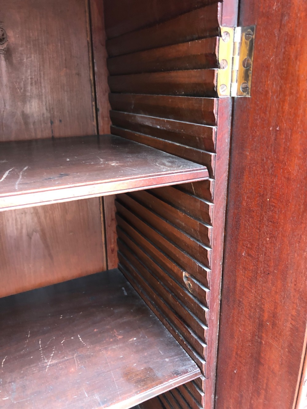 Early C19th Regency period mahogany 4-door ‘dwarf’ bookcase cabinet of breakfront outline. View IX