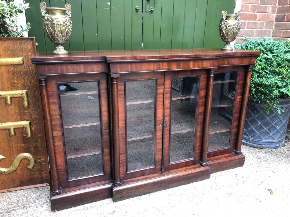 Early C19th Regency period mahogany 4-door ‘dwarf’ bookcase cabinet of breakfront outline. View XI