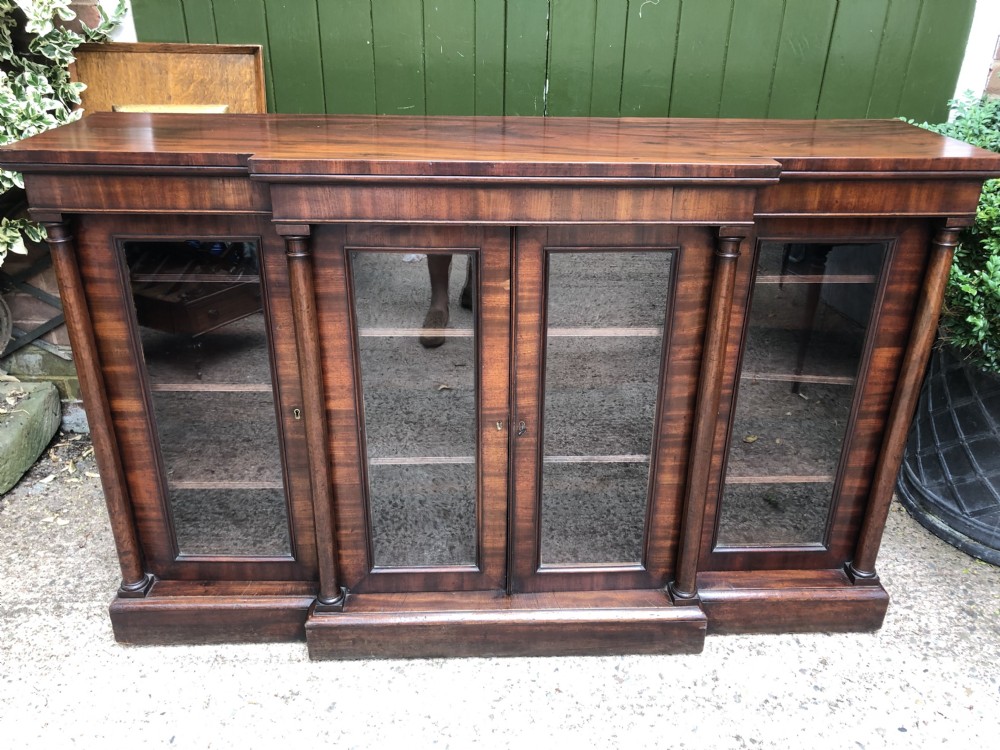 Early C19th Regency period mahogany 4-door ‘dwarf’ bookcase cabinet of breakfront outline. View XVII