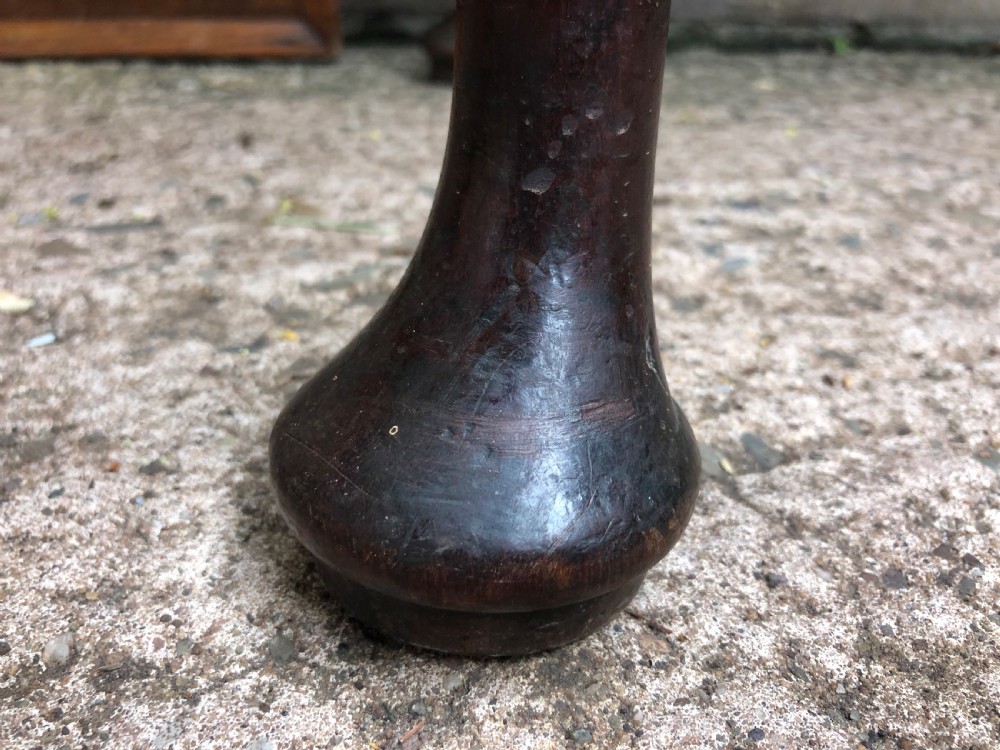 A mid-18th-century George II mahogany fold-over card table featuring slender cabriole legs terminating in pad feet and a shaped top. View XVII