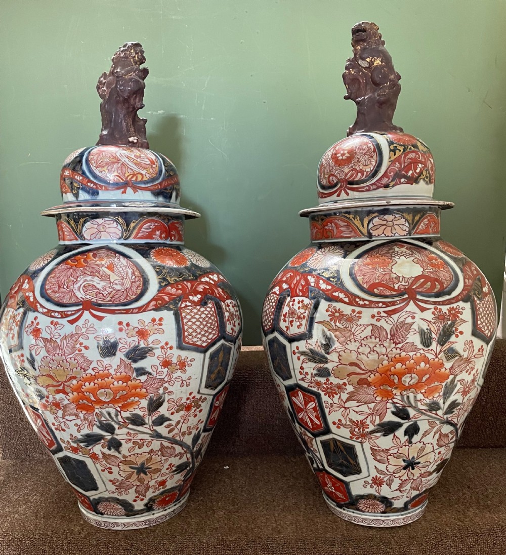 Pair of large late C17th / early C18th Japanese Genroku period porcelain vases and covers decorated in the Imari palette. View II