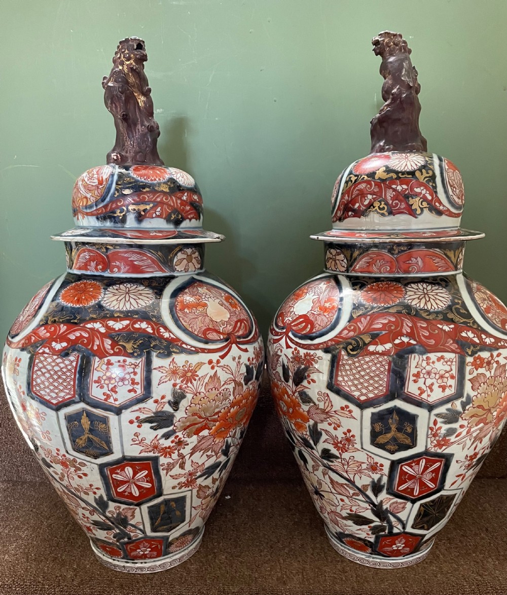 Pair of large late C17th / early C18th Japanese Genroku period porcelain vases and covers decorated in the Imari palette. View V
