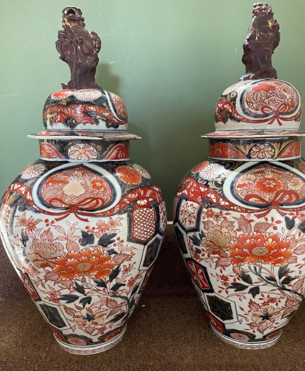 Pair of large late C17th / early C18th Japanese Genroku period porcelain vases and covers decorated in the Imari palette. View X