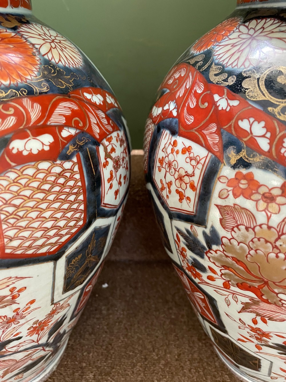 Pair of large late C17th / early C18th Japanese Genroku period porcelain vases and covers decorated in the Imari palette. View XVII