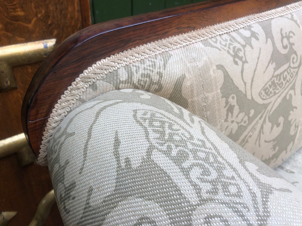 Early C19th William IV period carved rosewood framed sofa of practical scale and proportions. View IX