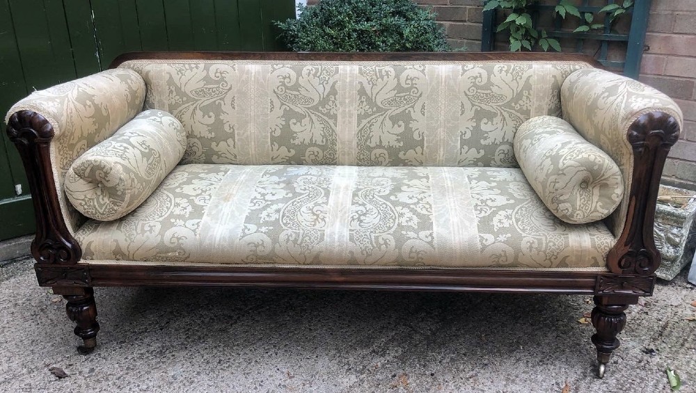 Early C19th William IV period carved rosewood framed sofa of practical scale and proportions.