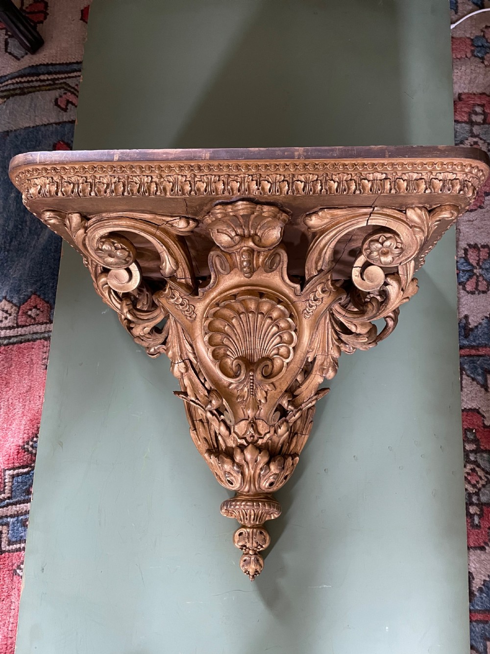 A large scale late C19th French rococo-style gilt-wood and gilded gesso wall bracket in the Louis XVI taste .
