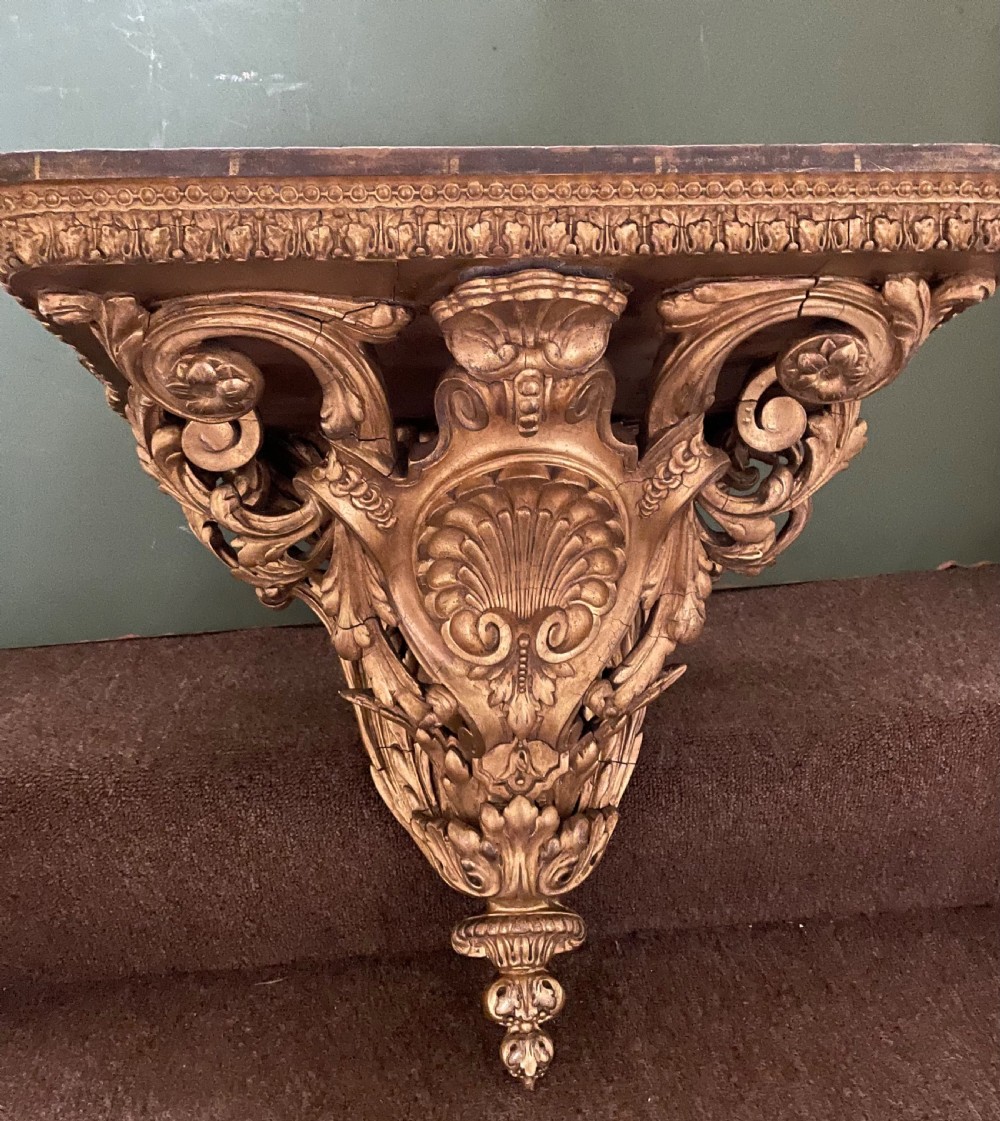 A large scale late C19th French rococo-style gilt-wood and gilded gesso wall bracket in the Louis XVI taste . View X