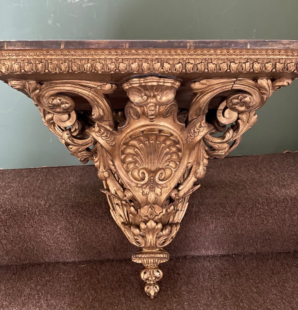 A large scale late C19th French rococo-style gilt-wood and gilded gesso wall bracket in the Louis XVI taste . View XI