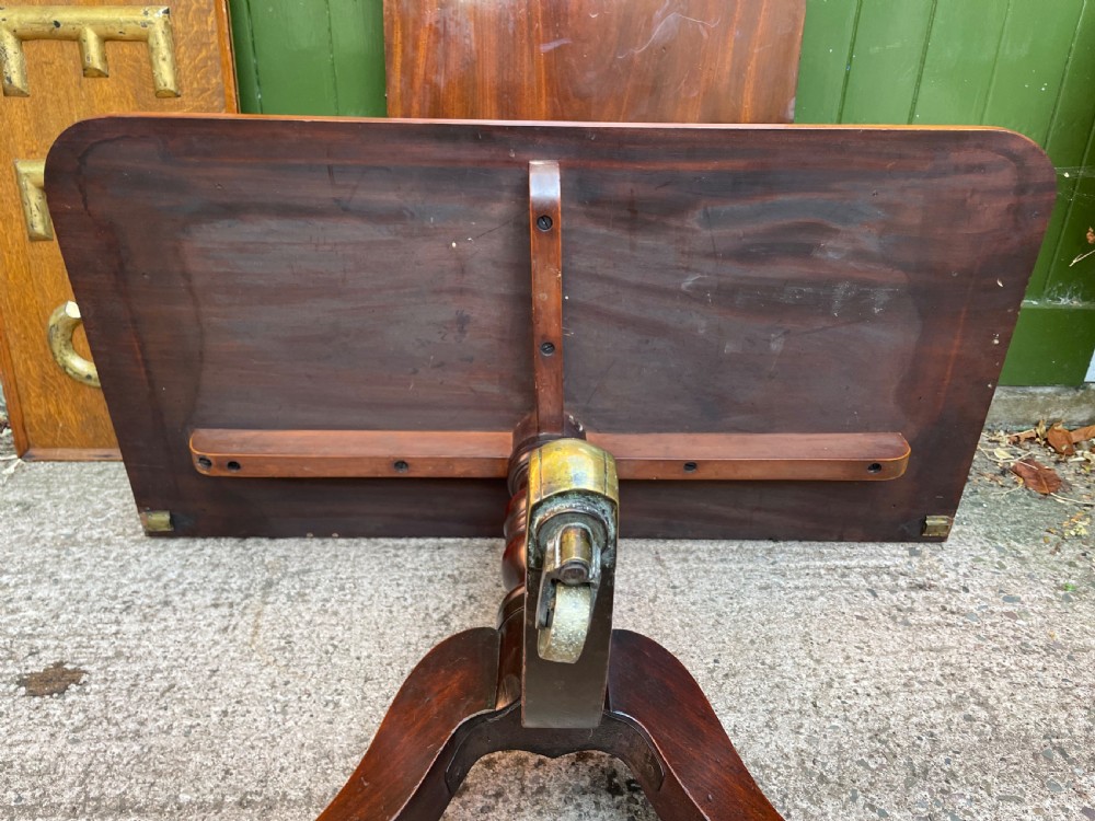 Early C19th Regency period mahogany twin-pillar dining table . View IX
