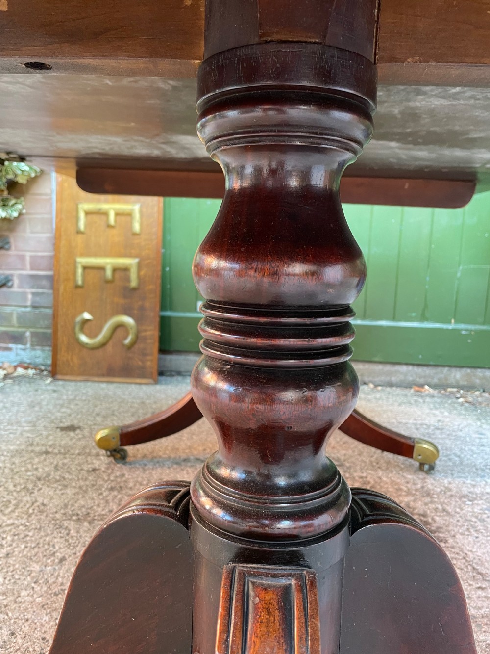 Early C19th Regency period mahogany twin-pillar dining table . View XIII