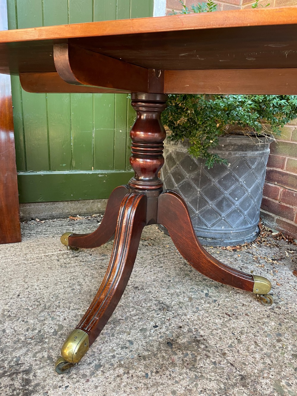 Early C19th Regency period mahogany twin-pillar dining table . View XVIII