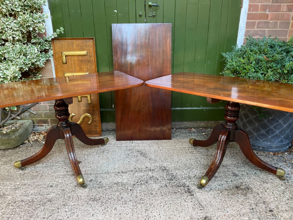 Early C19th Regency period mahogany twin-pillar dining table . View XX