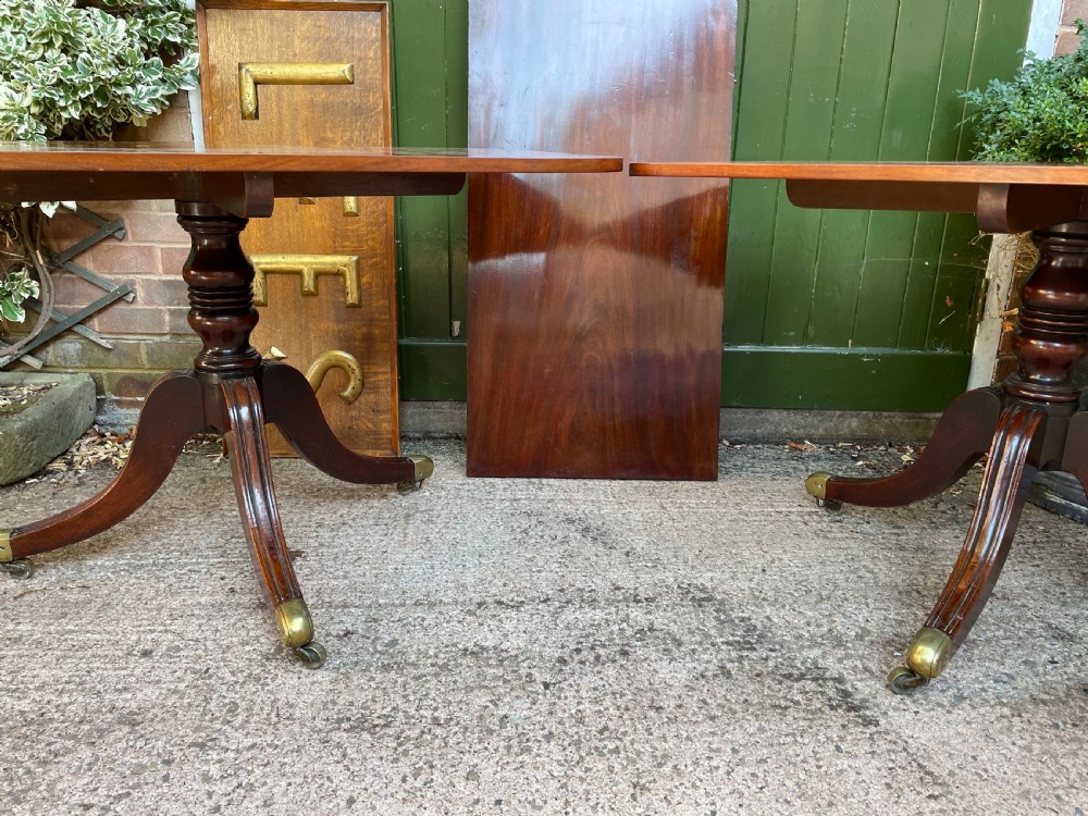 Early C19th Regency period mahogany twin-pillar dining table . View XXII