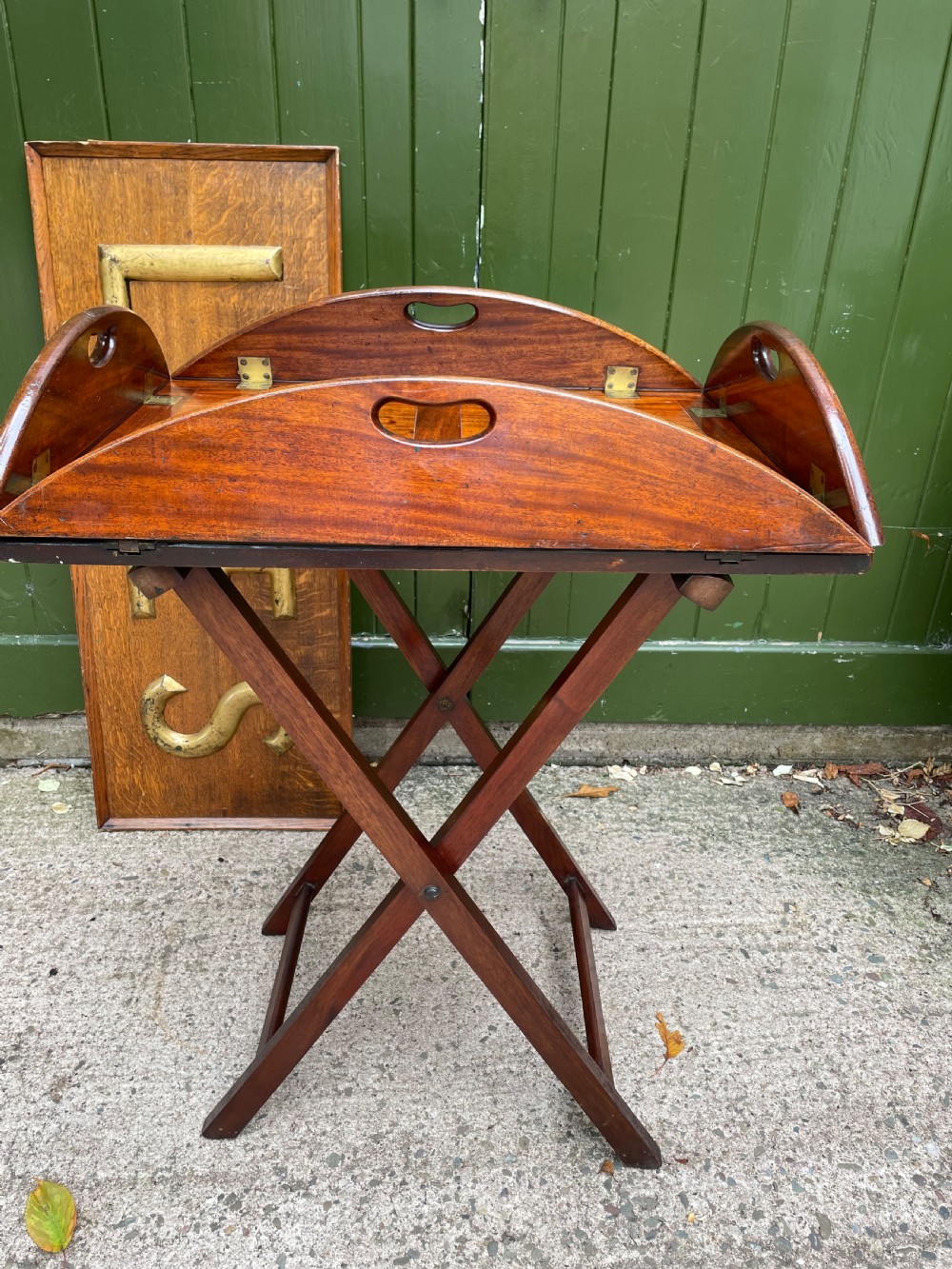 Late C18th George III period hinged and folding-sided oval mahogany butler’s tray and stand . View V