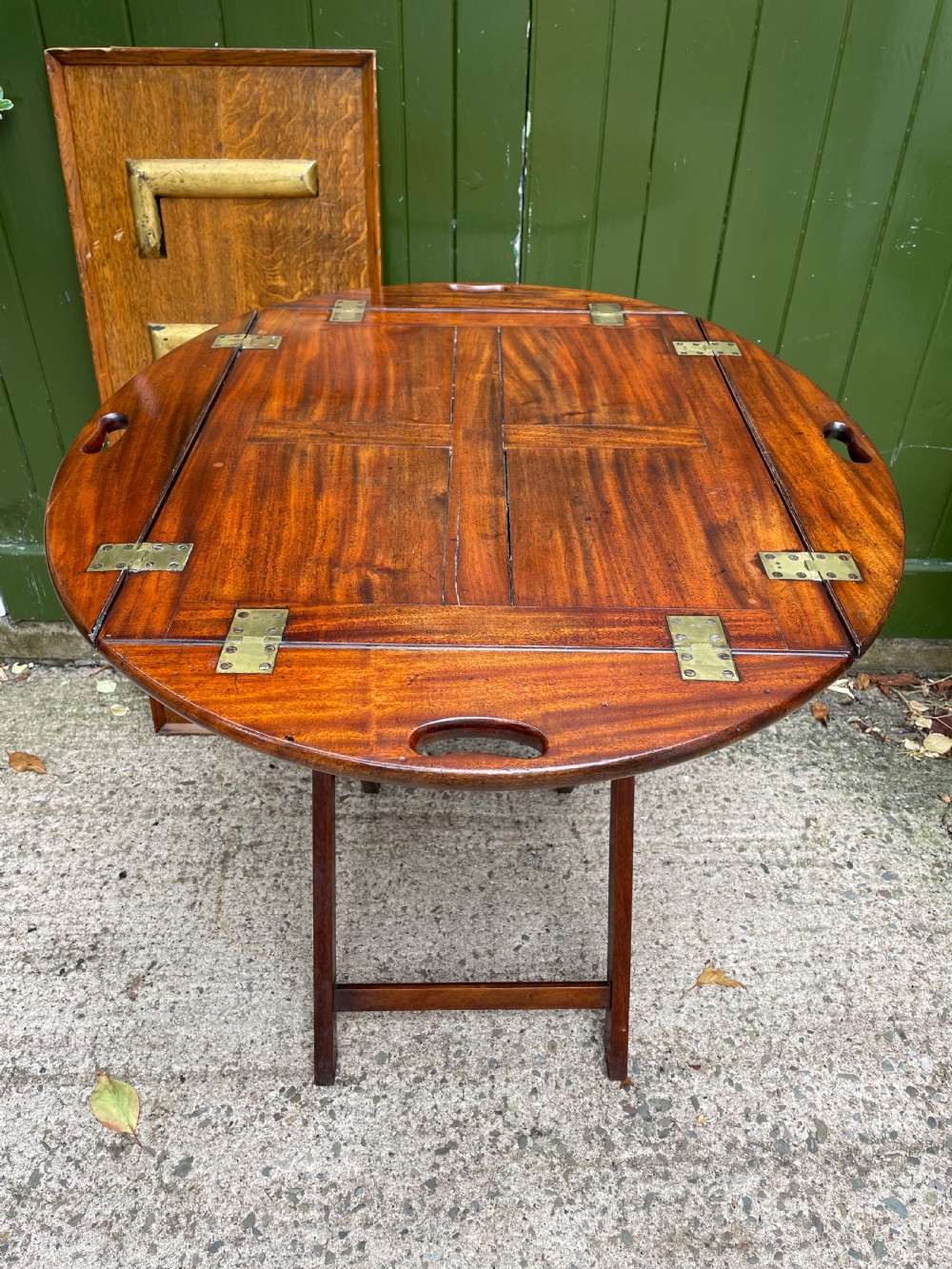 Late C18th George III period hinged and folding-sided oval mahogany butler’s tray and stand . View X