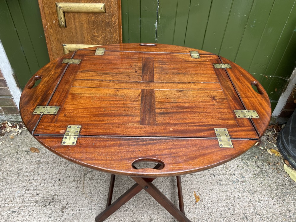 Late C18th George III period hinged and folding-sided oval mahogany butler’s tray and stand . View II