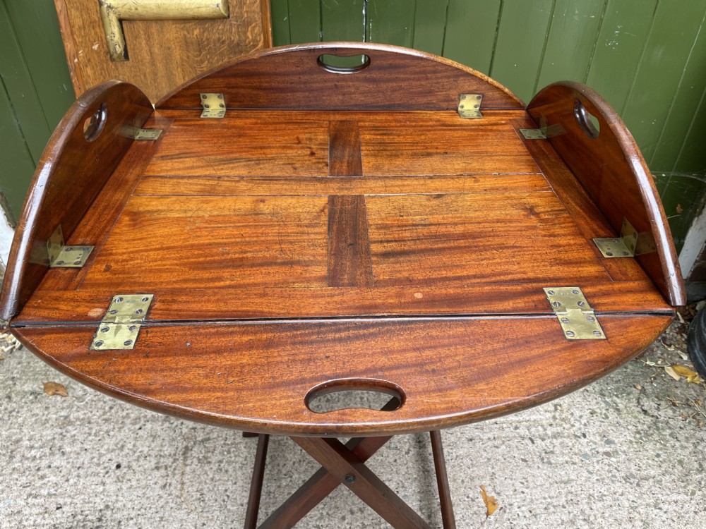 Late C18th George III period hinged and folding-sided oval mahogany butler’s tray and stand . View IV