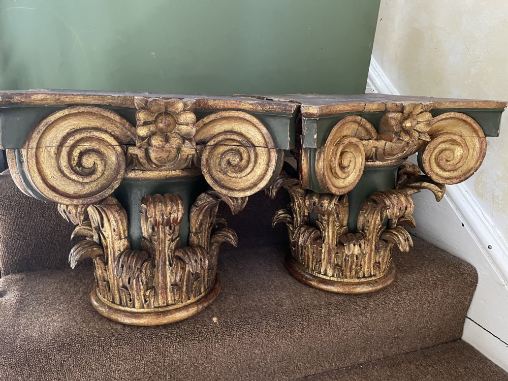 Pair of late C19th Italian carved walnut painted and gilded corinthian capitals 