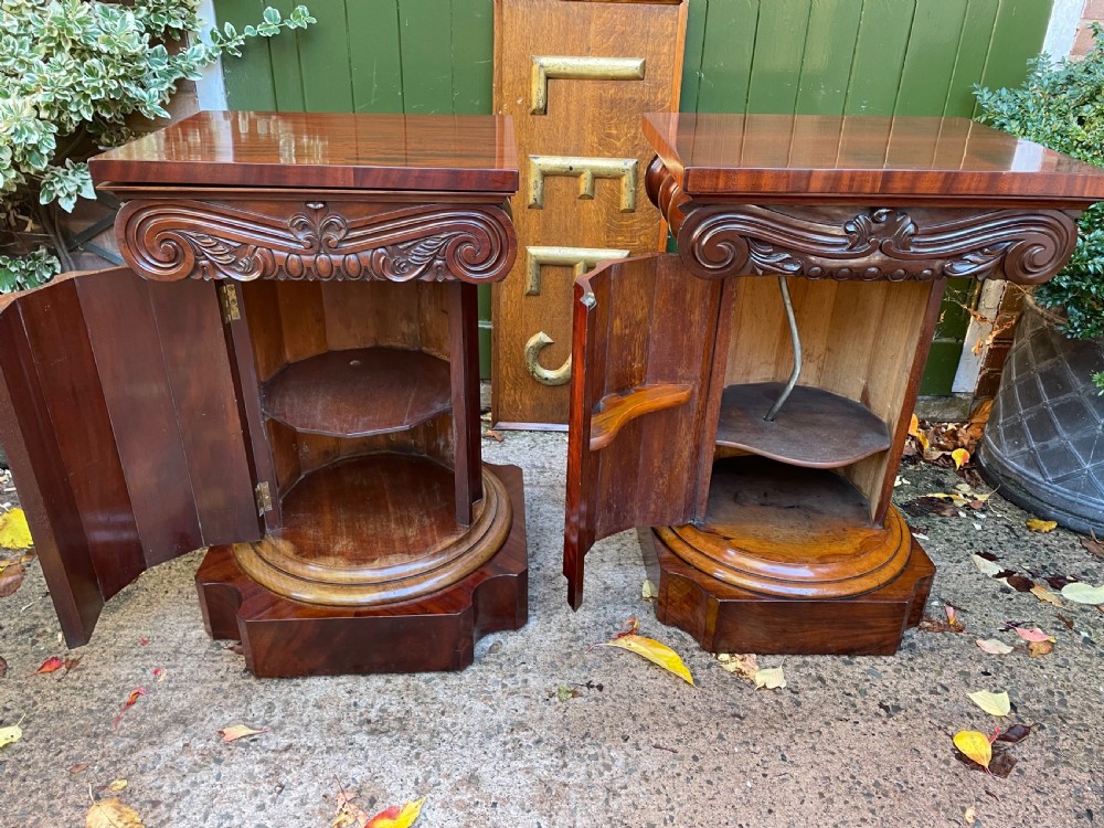 A matched pair of William IV mahogany pedestals designed in classical ionic column form with fluted shafts and stepped bases. View VII
