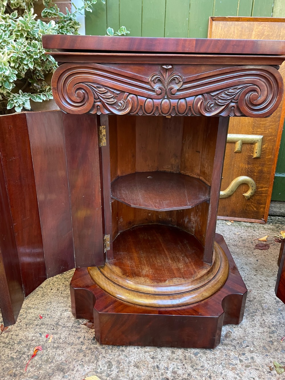 A matched pair of William IV mahogany pedestals designed in classical ionic column form with fluted shafts and stepped bases. View VIII