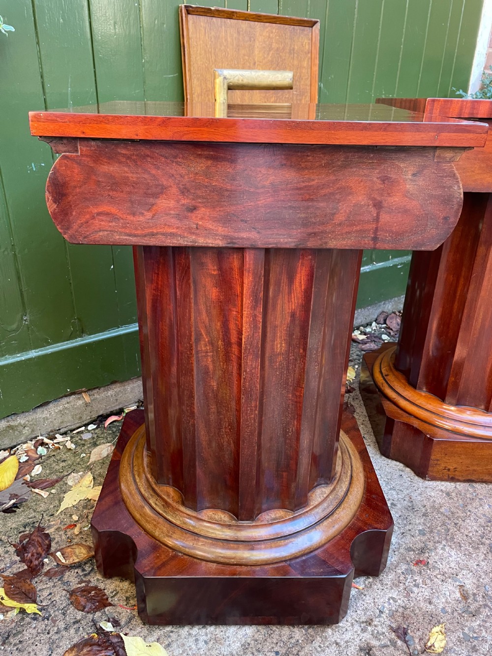 A matched pair of William IV mahogany pedestals designed in classical ionic column form with fluted shafts and stepped bases. View XII