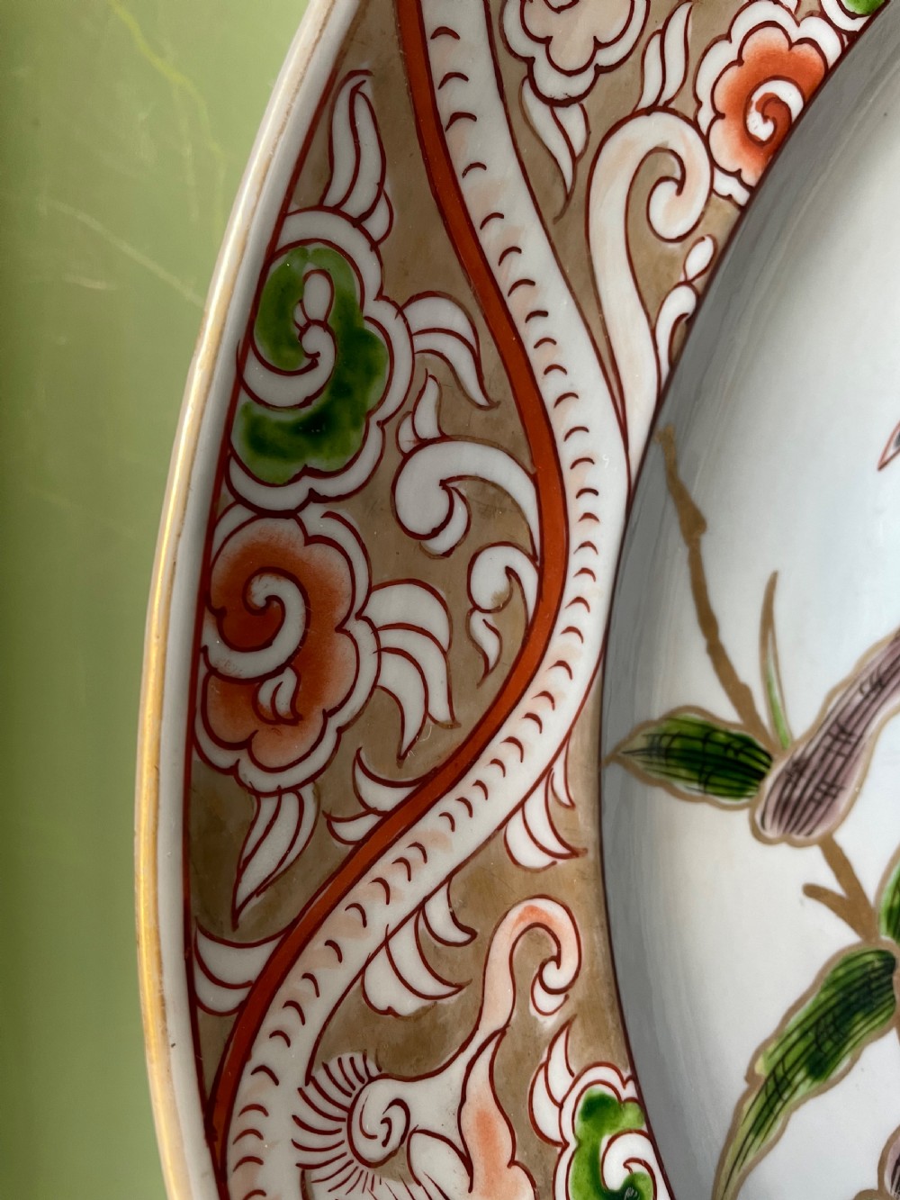 C19th dished porcelain charger in the early C18th Japanese Imari style by Samson. View III