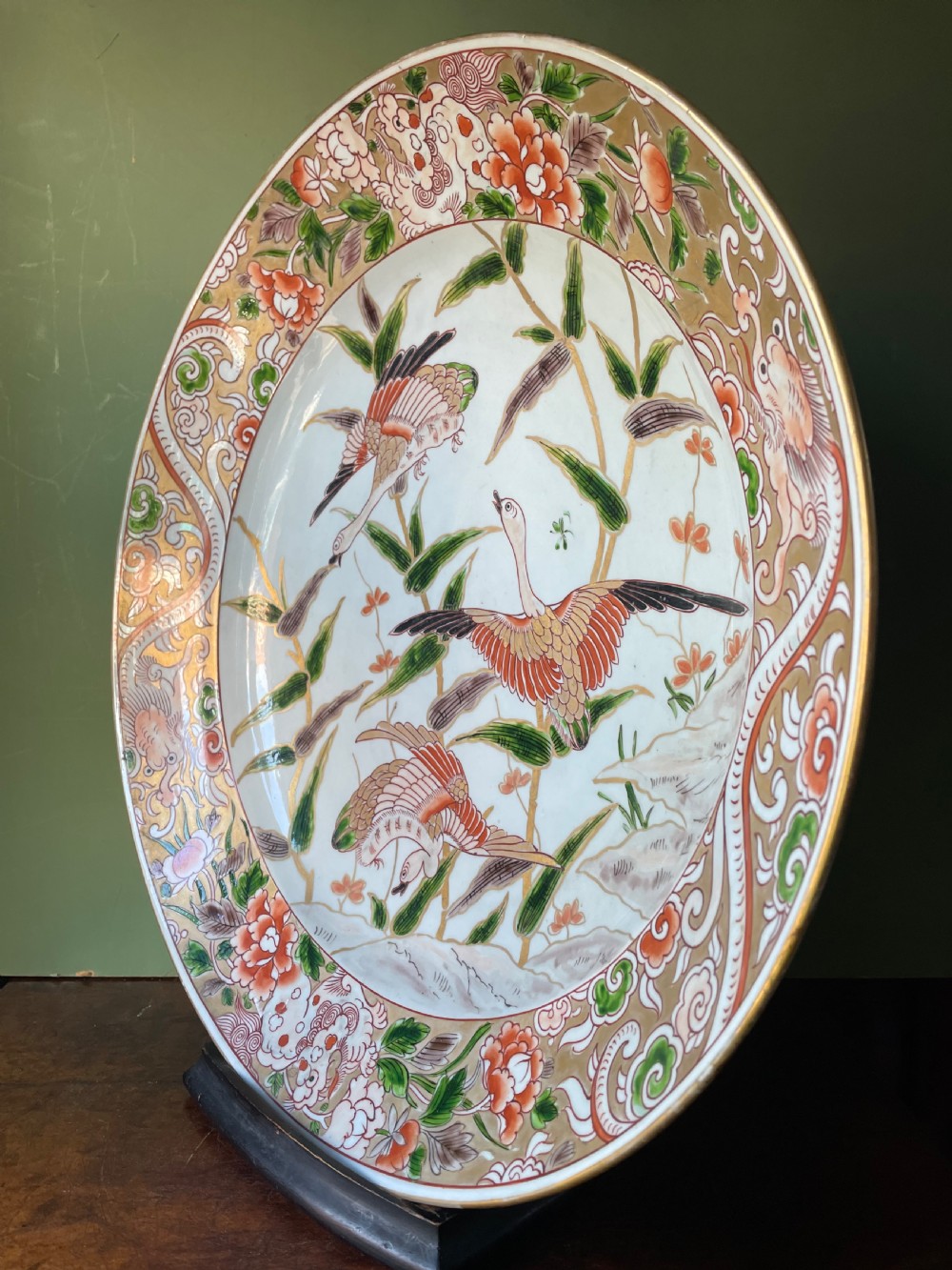 C19th dished porcelain charger in the early C18th Japanese Imari style by Samson. View V