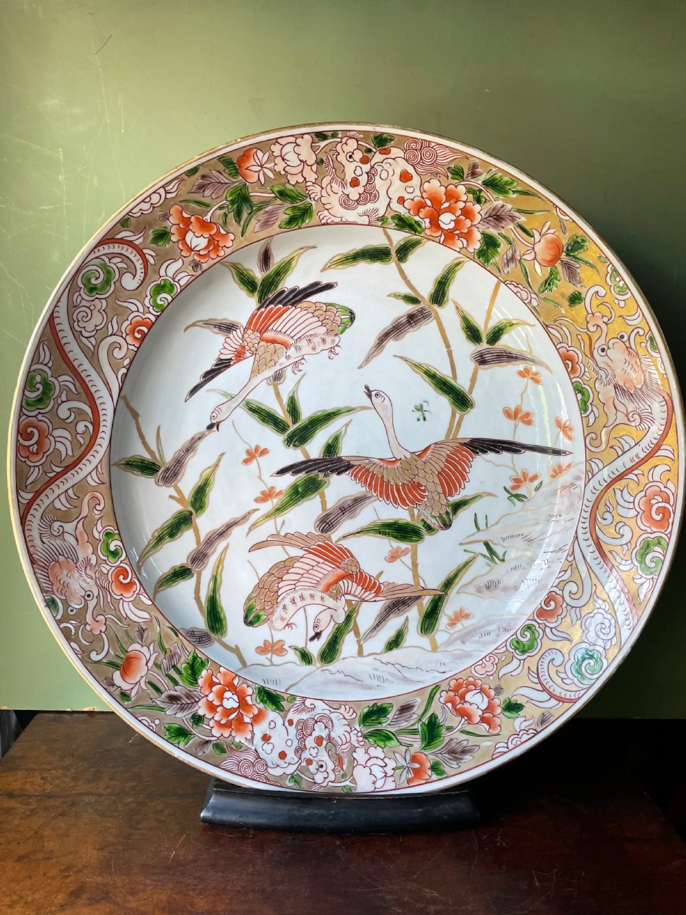 C19th dished porcelain charger in the early C18th Japanese Imari style by Samson. View VI