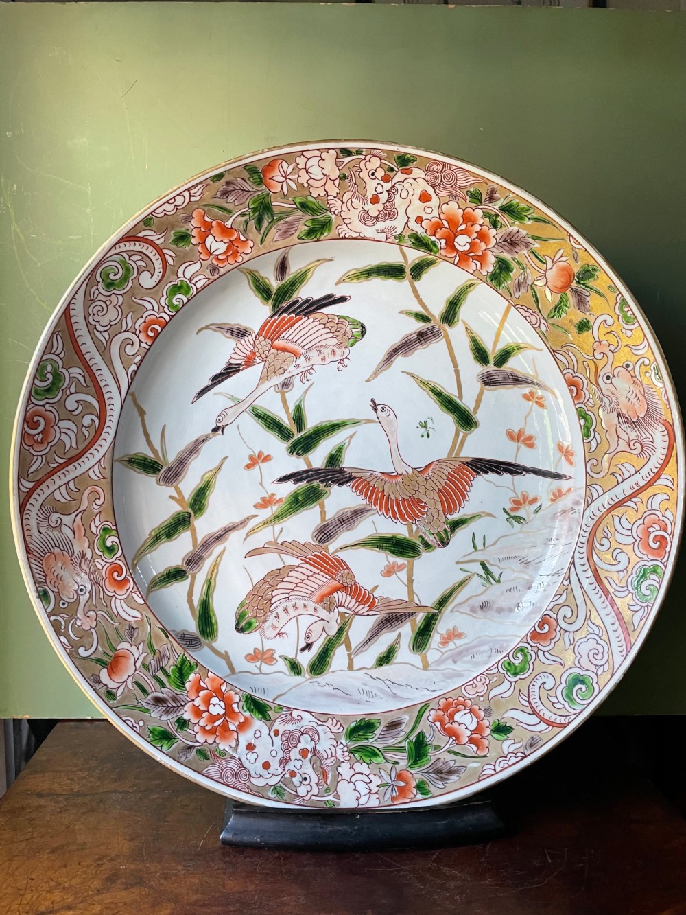 C19th dished porcelain charger in the early C18th Japanese Imari style by Samson. View XIV