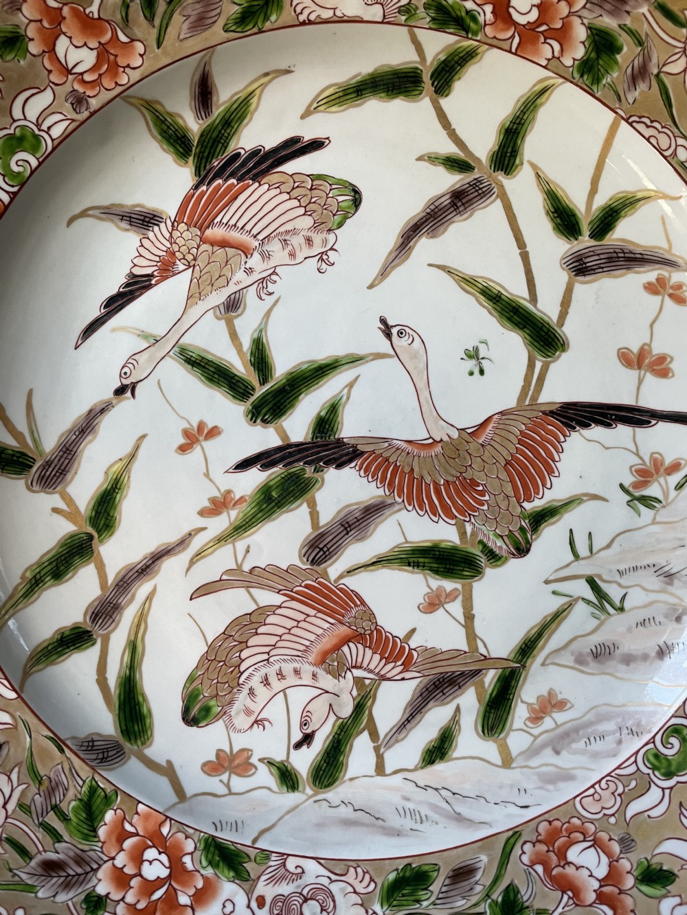 C19th dished porcelain charger in the early C18th Japanese Imari style by Samson. View XVII