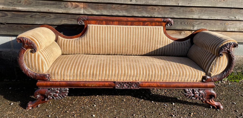 Impressive mid C19th carved mahogany framed Empire style scroll-ended settee.
