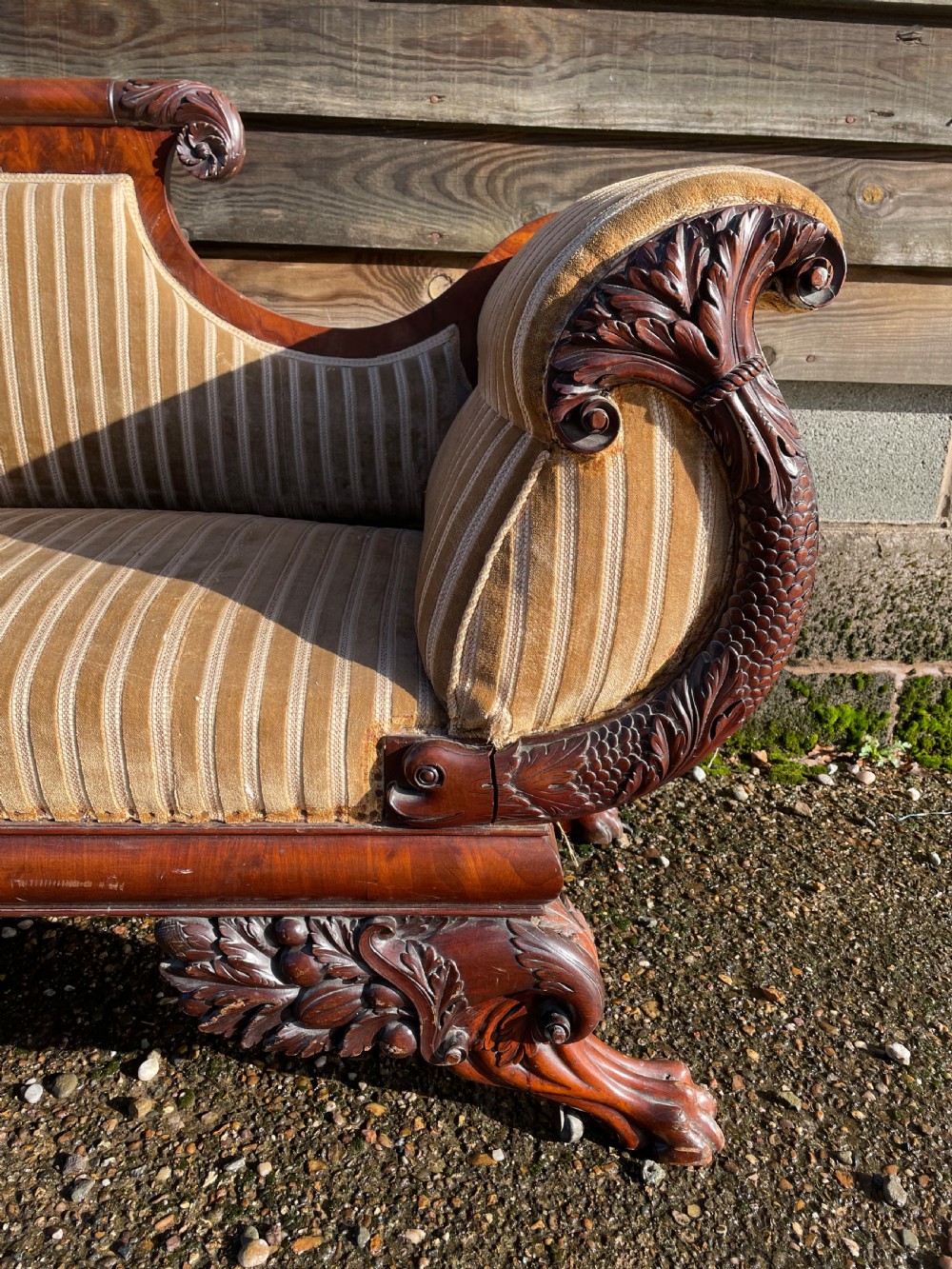 Impressive mid C19th carved mahogany framed Empire style scroll-ended settee. View VIII