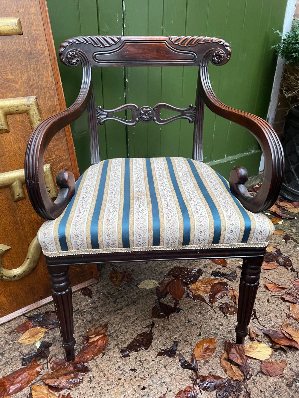 Early C19th Regency period carved mahogany armchair.
