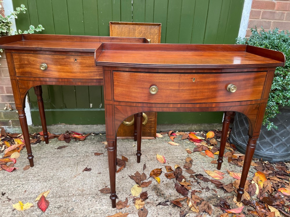 Pair of elegant early C19th late George III period mahogany bow-front side tables . View IX