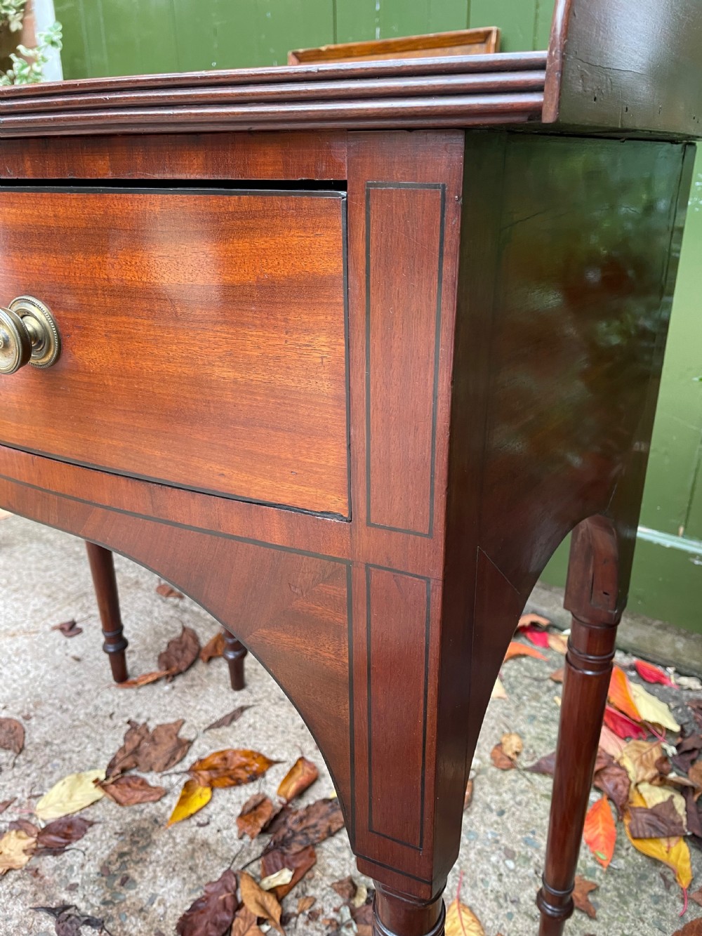 Pair of elegant early C19th late George III period mahogany bow-front side tables . View XI