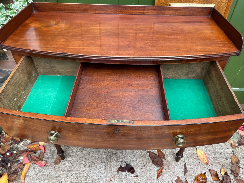 Pair of elegant early C19th late George III period mahogany bow-front side tables . View XIV