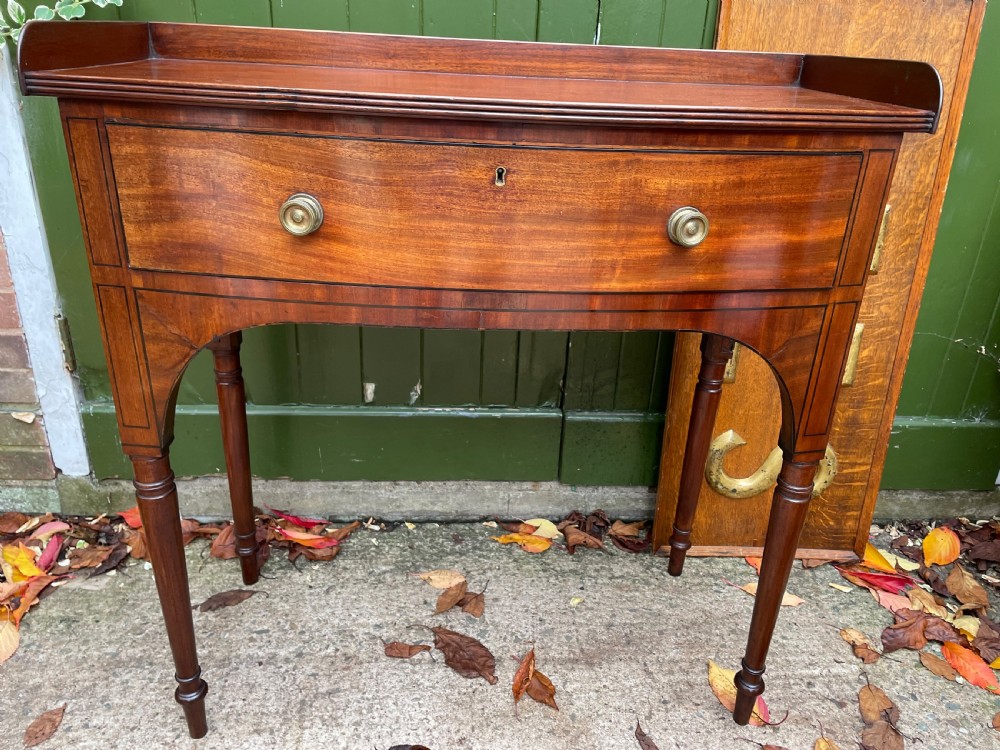 Pair of elegant early C19th late George III period mahogany bow-front side tables . View XV