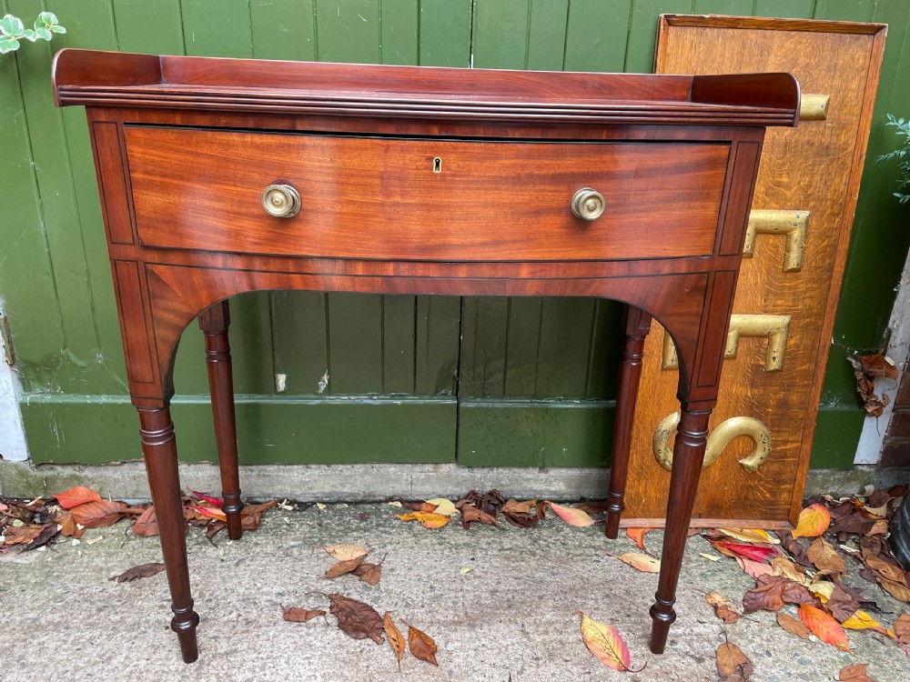 Pair of elegant early C19th late George III period mahogany bow-front side tables . View XVII