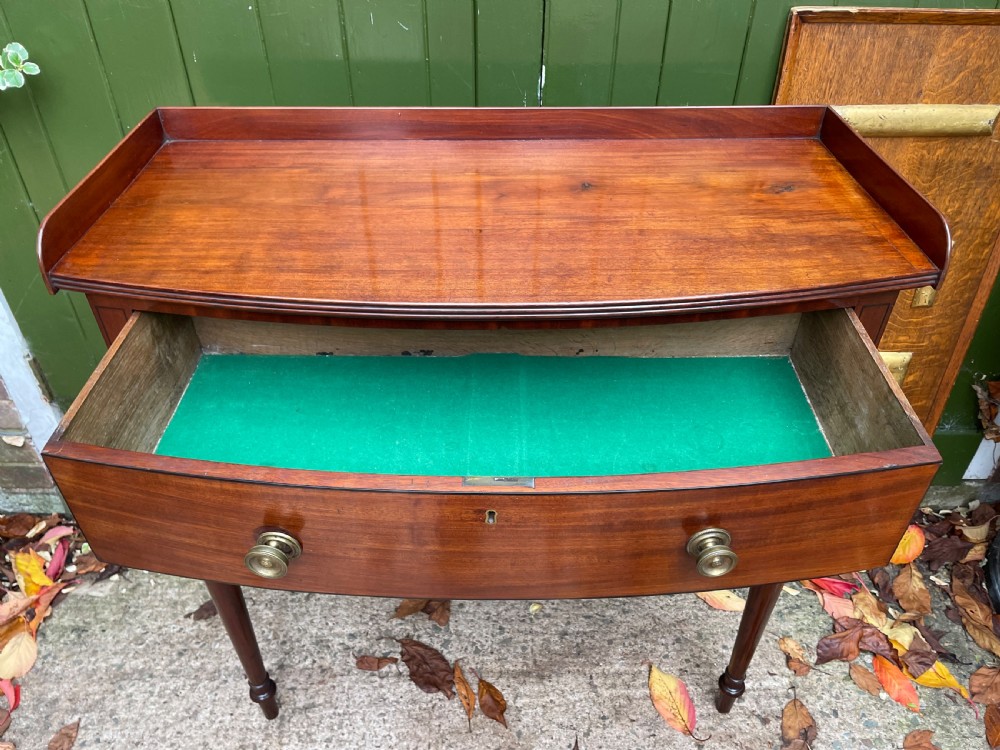 Pair of elegant early C19th late George III period mahogany bow-front side tables . View XVIII