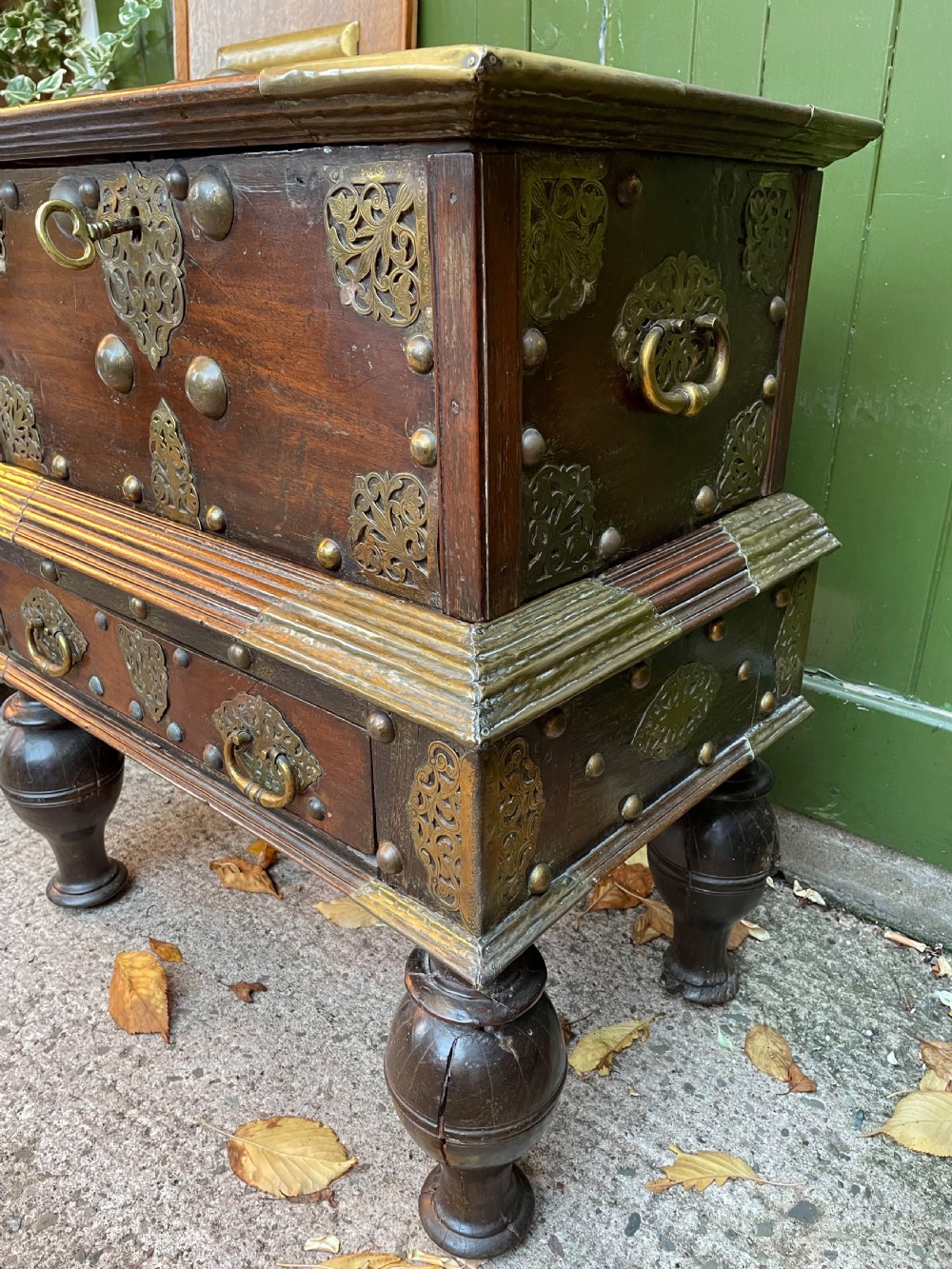 C18th Dutch East Indies Colonial brass-mounted teak coffer on stand . View IV