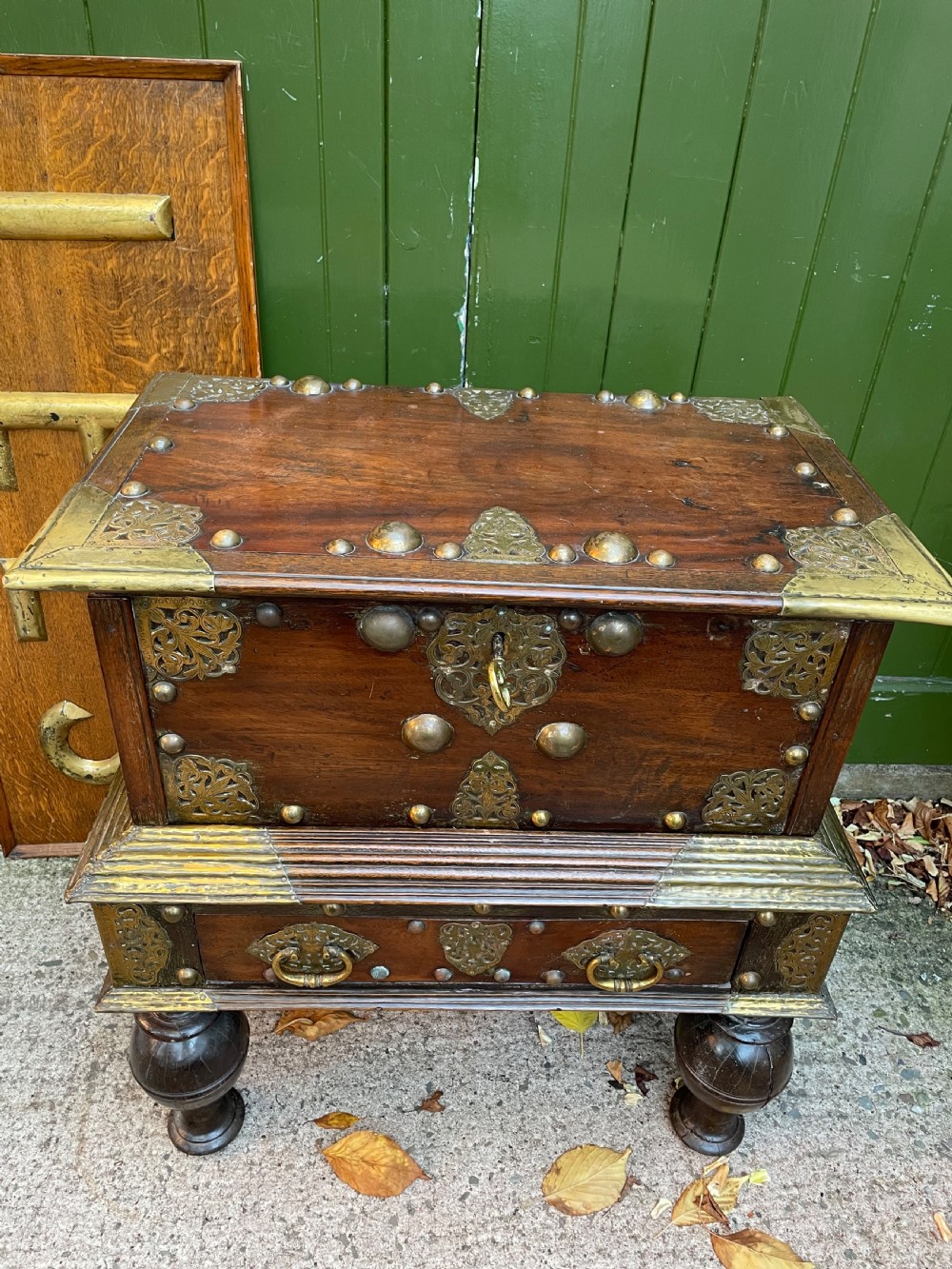 C18th Dutch East Indies Colonial brass-mounted teak coffer on stand . View VI