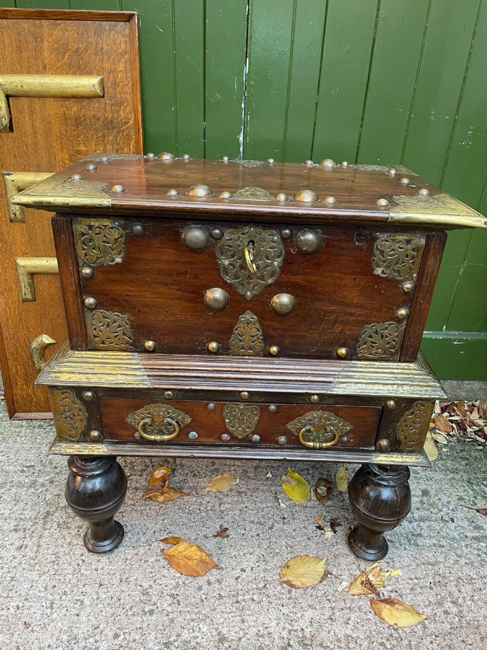 C18th Dutch East Indies Colonial brass-mounted teak coffer on stand . View VIII