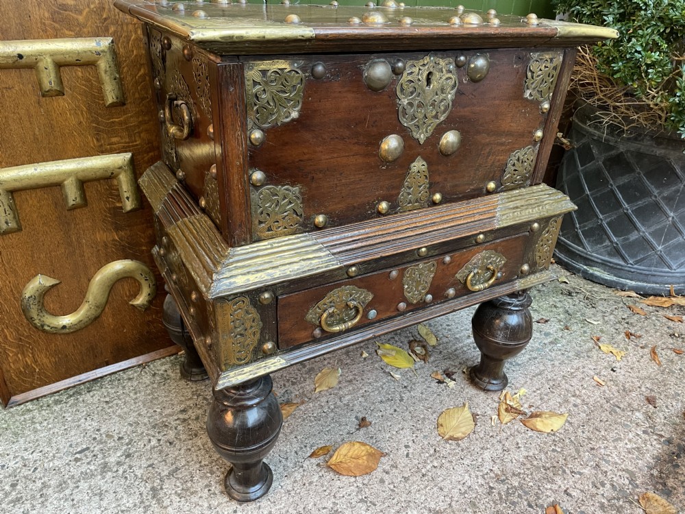 C18th Dutch East Indies Colonial brass-mounted teak coffer on stand . View XVIII